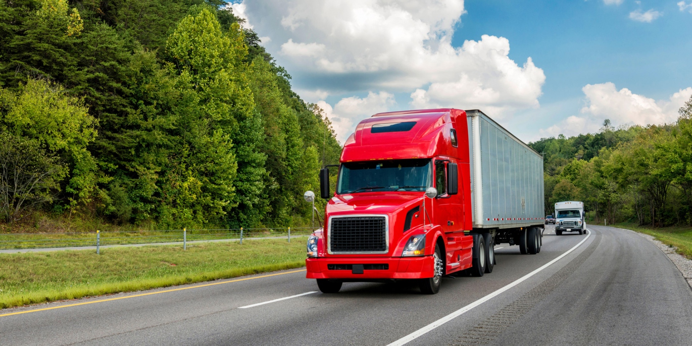 Full Truckload FTL shipping service offered by Silverline Shipping with a large truck on a highway