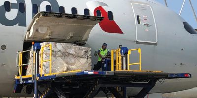 Illustration of a world map with shipping routes connecting continents, representing Our Reach of Silverline Shipping's