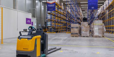 Illustration of a global supply chain network with interconnected nodes and shipping icons, representing Supply Chain